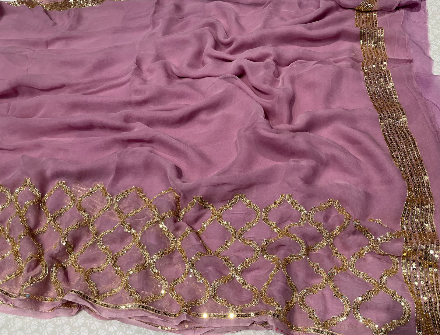 LAVENDER COLOUR PURE CHIFFON HAND EMBROIDERED SAREE EMBELLISHED WITH SEQUINS & CUD