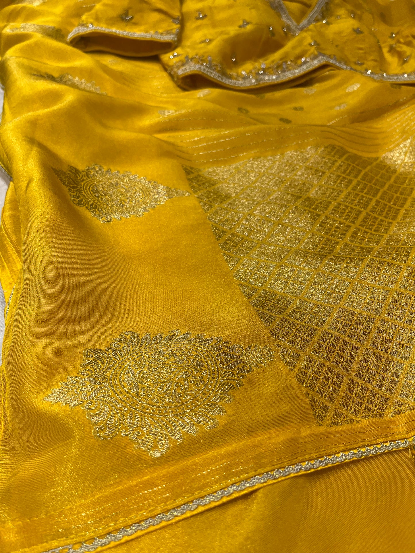 YELLOW DOLA TISSUE SILK SAREE WITH PEARL & CUTDANA EMBELLISHED READYMADE BLOUSE