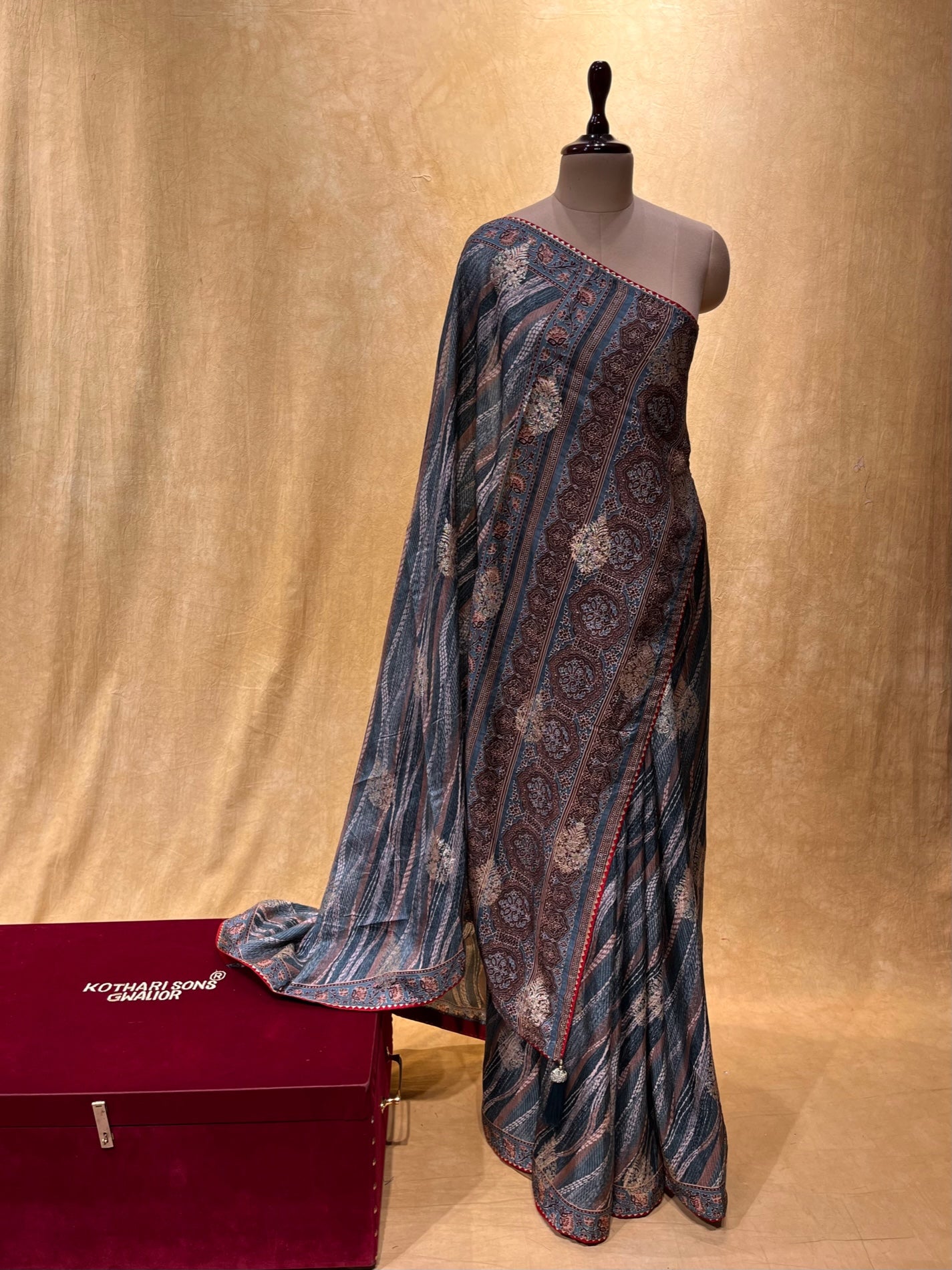 GREY BLUE COLOUR DOLA SILK PRINTED SAREE EMBELLISHED WITH ZARI BOOTA