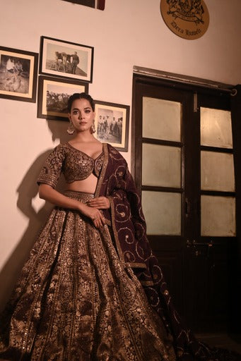 ( DELIVERY IN 30-40 DAYS ) PURPLE COLOUR BANARASI LEHENGA WITH READYMADE BLOUSE & ORGANZA DUPATTA EMBELLISHED WITH ZARI WORK
