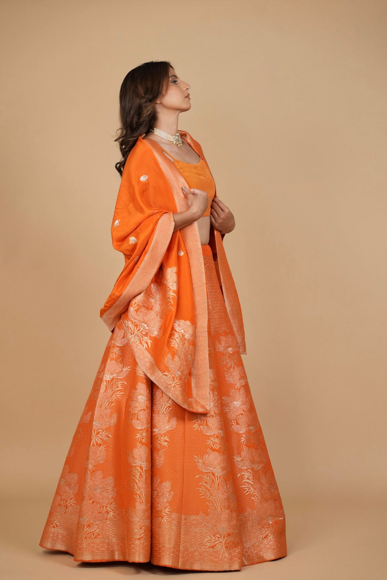 ORANGE BANARASI LEHENGA WITH DUPATTA AND MONOTONE BLOUSE