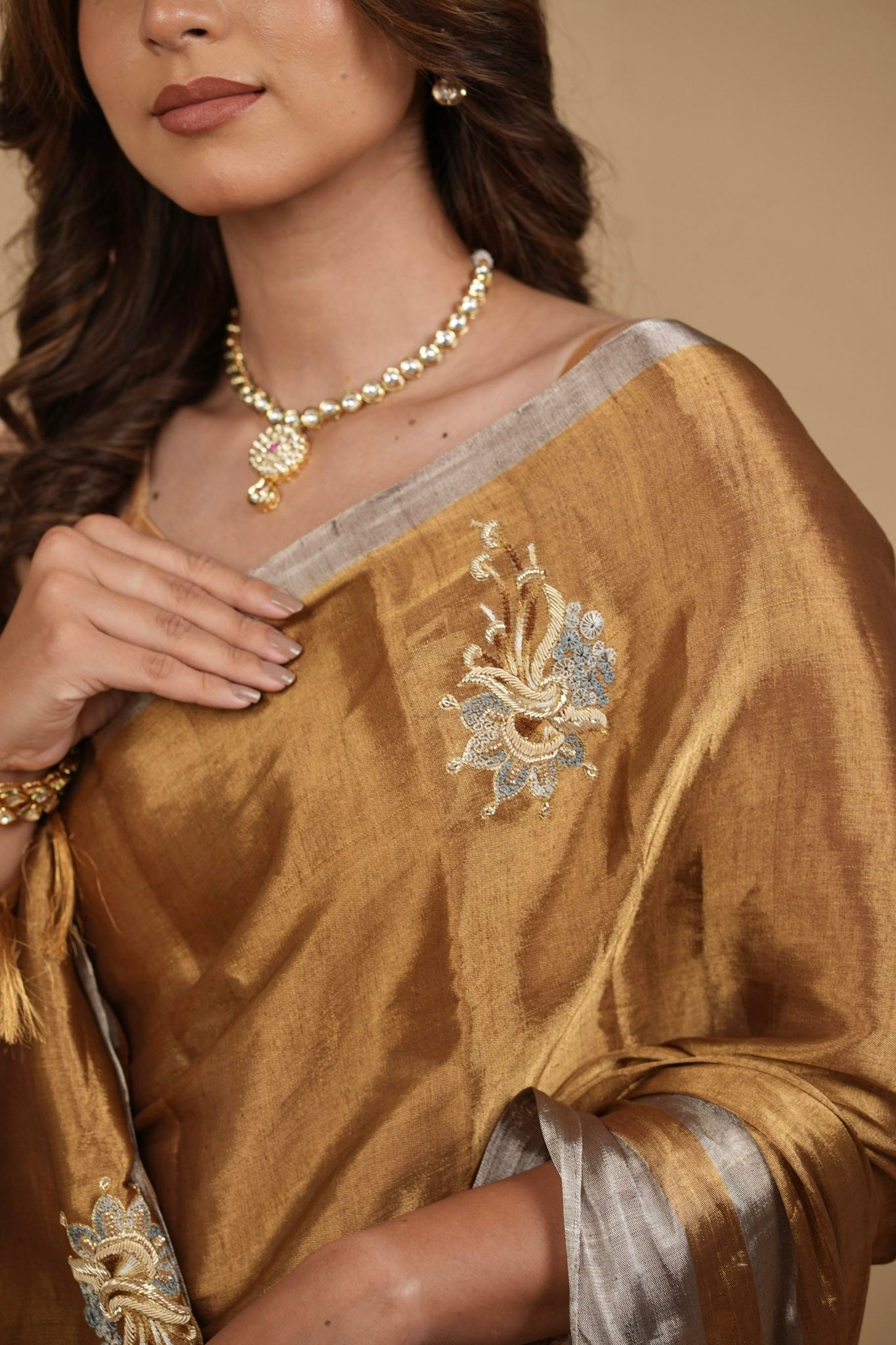 ANTIQUE GOLD CHANDERI SOFT TISSUE SAREE WITH ZARDOZI WORK MOTIFS