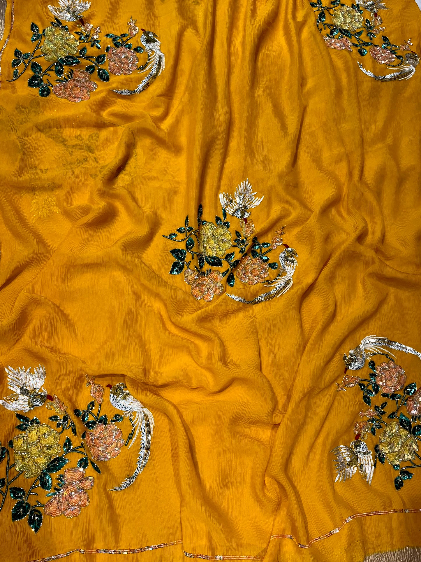 ( DELIVERY IN 30 DAYS ) YELLOW COLOUR PURE CHIFFON HAND EMBROIDERED SAREE EMBELLISHED WITH SEQUINS KARDHANA & ZARI WORK