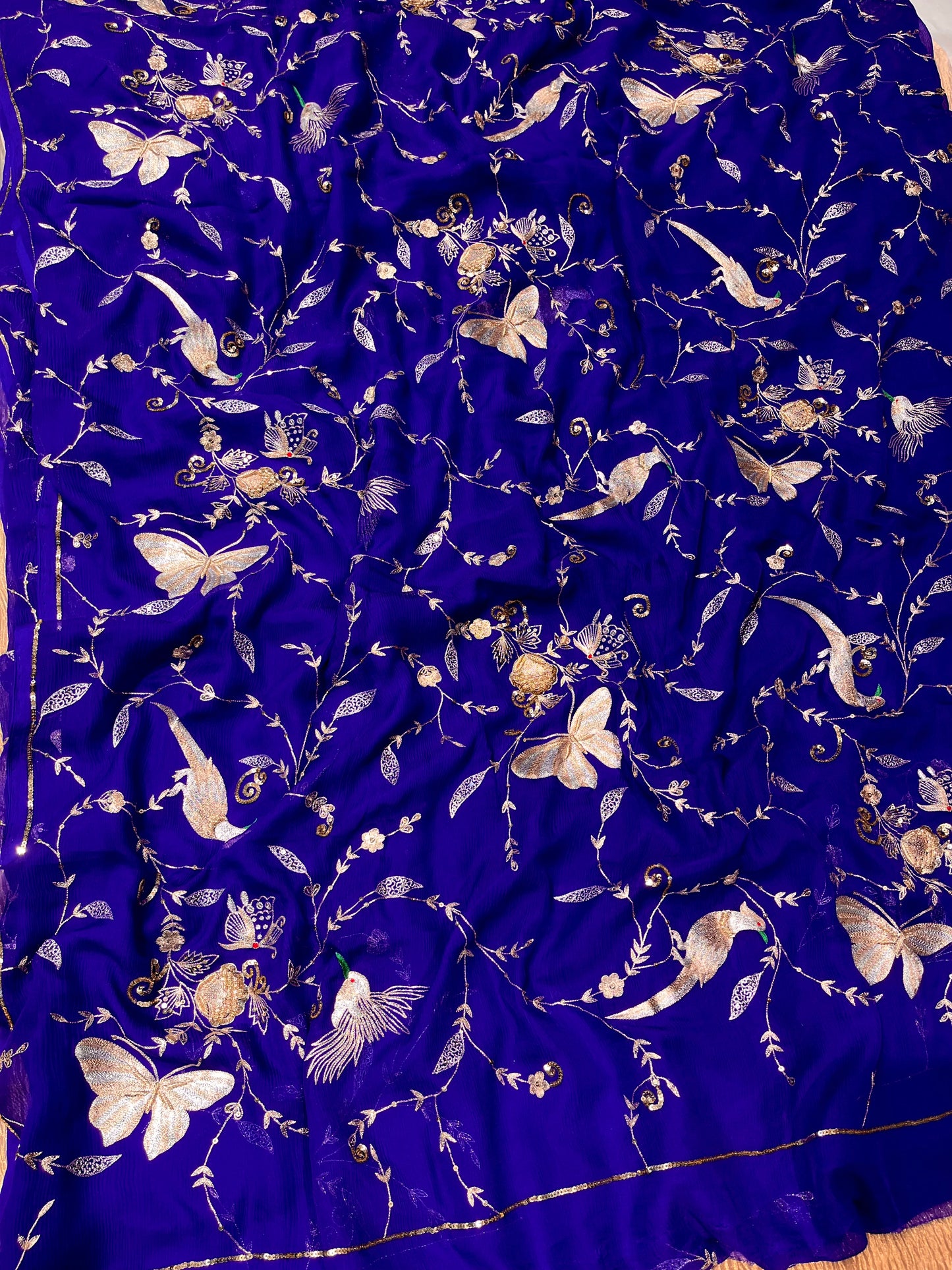 ( DELIVERY IN 30 DAYS ) BLUE COLOUR PURE CHIFFON HAND EMBROIDERED SAREE EMBELLISHED WITH SEQUINS ZARI & ZARDOZI WORK