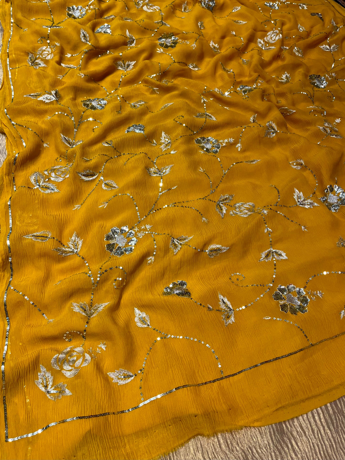 ( DELIVERY IN 30 DAYS ) YELLOW COLOUR PURE CHIFFON HAND EMBROIDERED SAREE EMBELLISHED WITH SEQUINS KARDHANA & AARI WORK