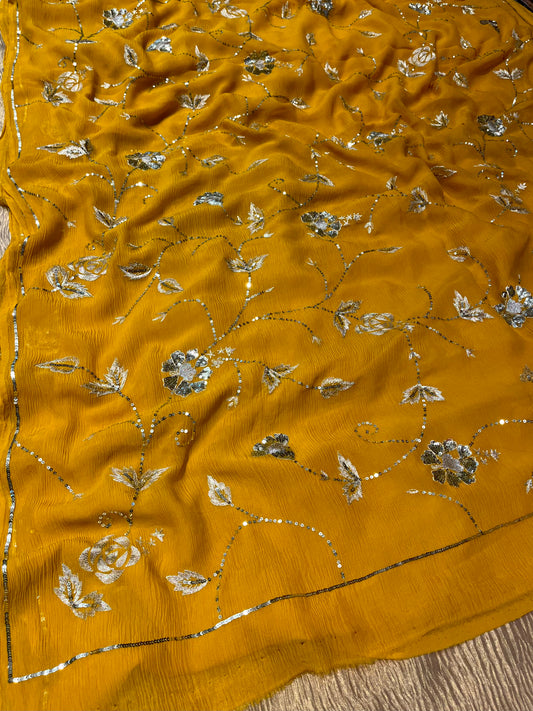 YELLOW COLOUR PURE CHIFFON HAND EMBROIDERED SAREE EMBELLISHED WITH SEQUINS KARDHANA & AARI WORK (DELIVERY IN 30 DAYS)