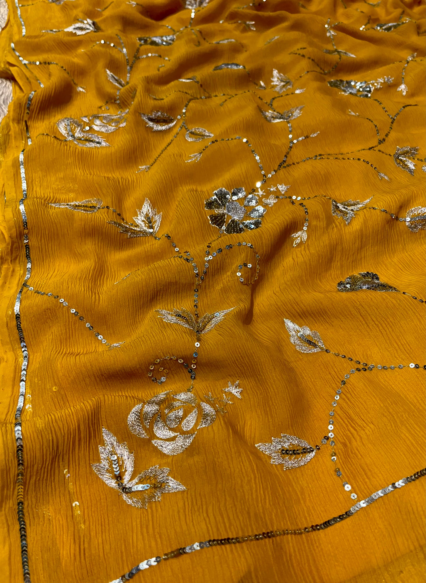 ( DELIVERY IN 30 DAYS ) YELLOW COLOUR PURE CHIFFON HAND EMBROIDERED SAREE EMBELLISHED WITH SEQUINS KARDHANA & AARI WORK