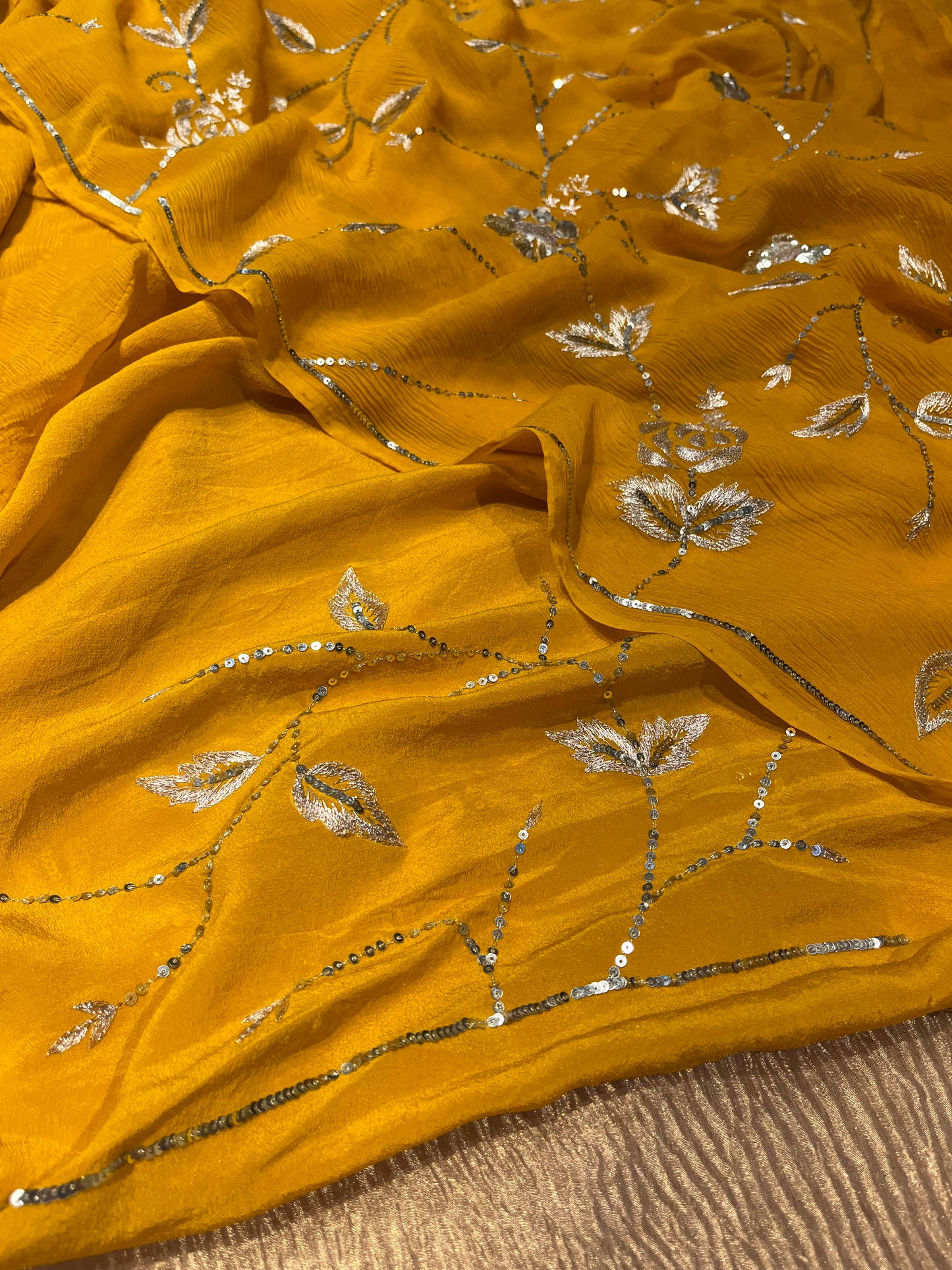 ( DELIVERY IN 30 DAYS ) YELLOW COLOUR PURE CHIFFON HAND EMBROIDERED SAREE EMBELLISHED WITH SEQUINS KARDHANA & AARI WORK