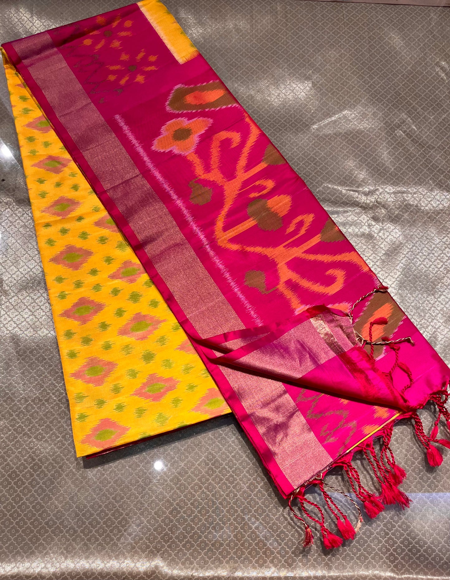 YELLOW COLOUR PURE SILK IKAT PATOLA SAREE EMBELLISHED WITH ZARI BORDER