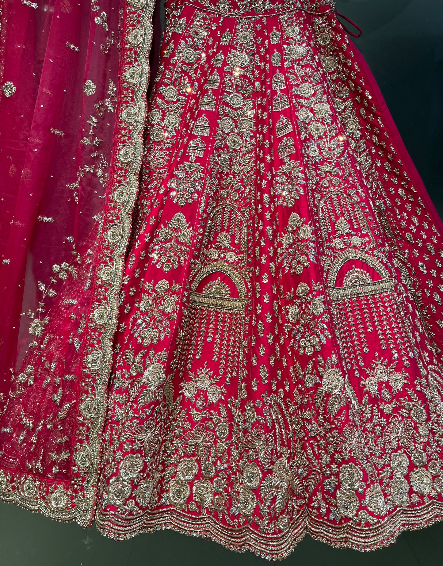 RANI COLOUR BRIDAL HAND EMBROIDERED LEHENGA WITH UNSTITCHED BLOUSE & ORGANZA DUPATTA EMBELLISHED WITH ZARDOZI WORK (Delivere in 30 Days)