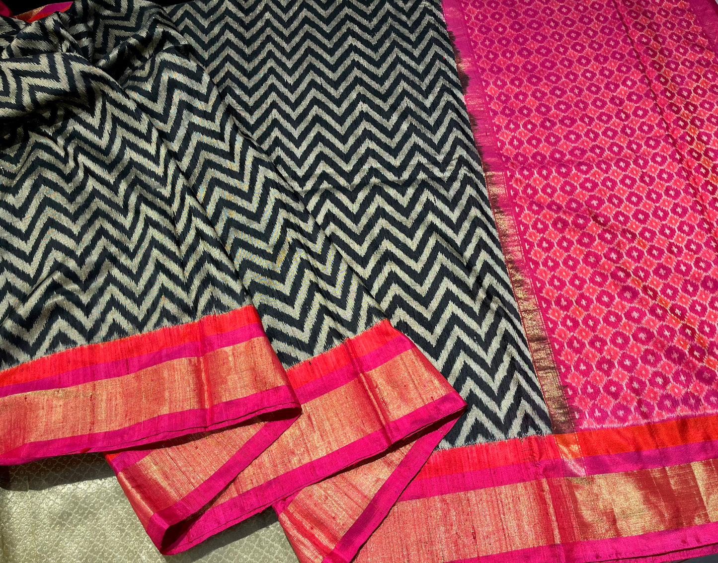 BLACK & WHITE COLOUR LINEN SILK IKAT PSTOLA SAREE EMBELLISHED WITH ZARI BORDER