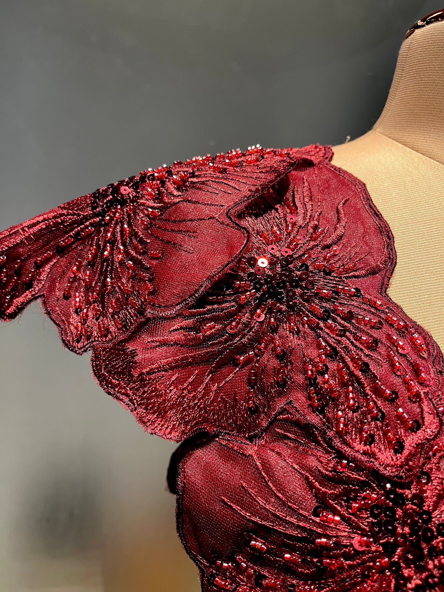 MAROON COLOUR SATIN EMBOSSED PRINT SAREE WITH READYMADE BLOUSE EMBELLISHED WITH FLORAL APPLIQUE WORK BORDER