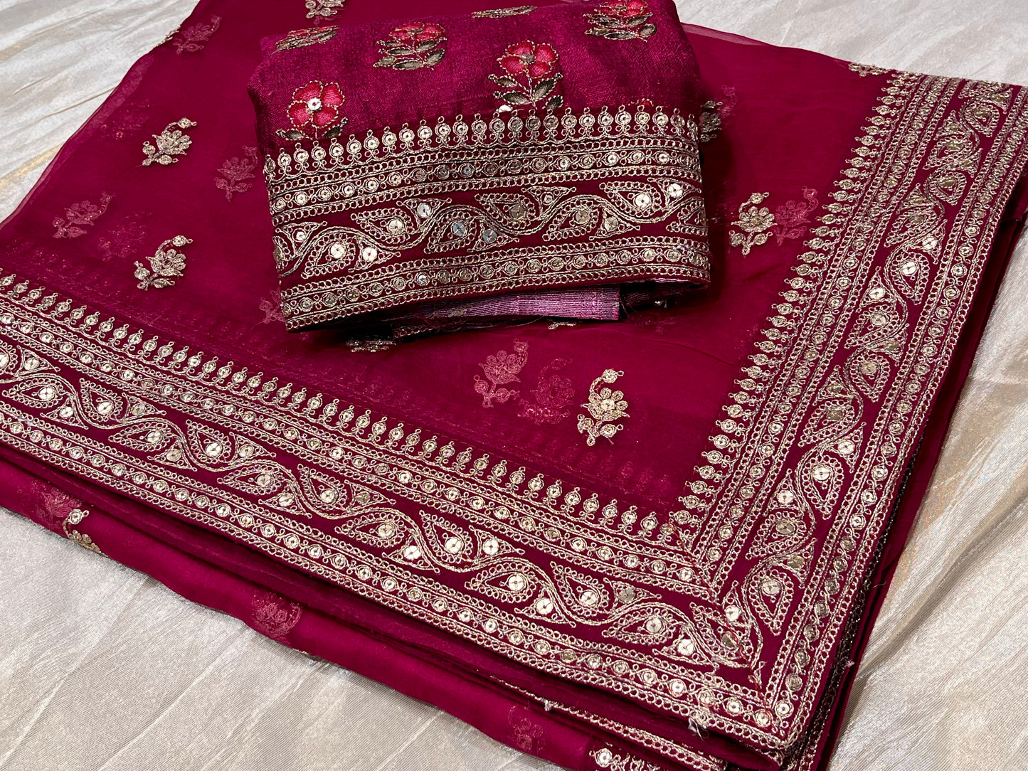 MAGENTA COLOUR PURE GEORGETTE HAND EMBROIDERED SAREE EMBELLISHED WITH AARI & SEQUINS WORK