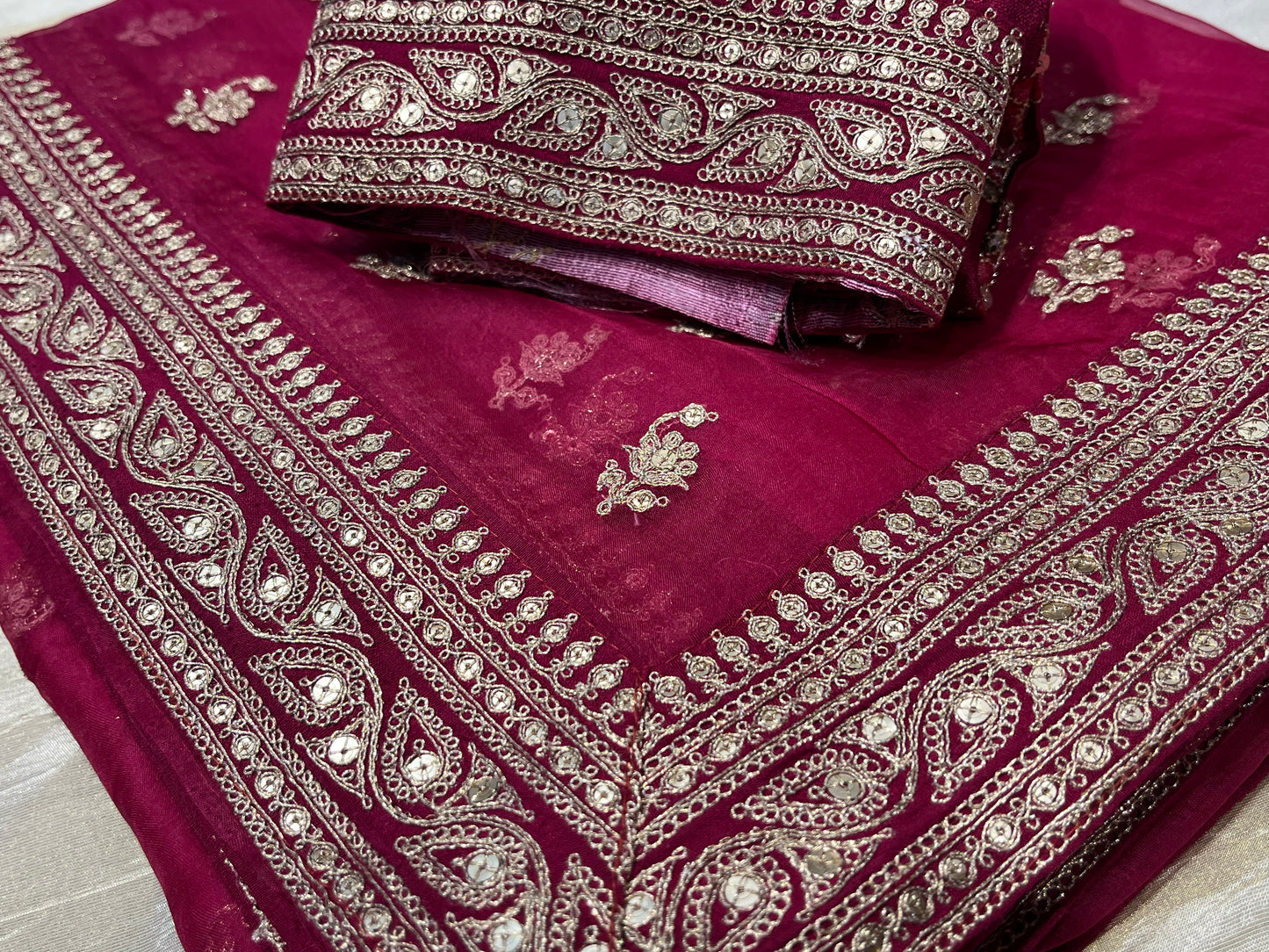 MAGENTA COLOUR PURE GEORGETTE HAND EMBROIDERED SAREE EMBELLISHED WITH AARI & SEQUINS WORK