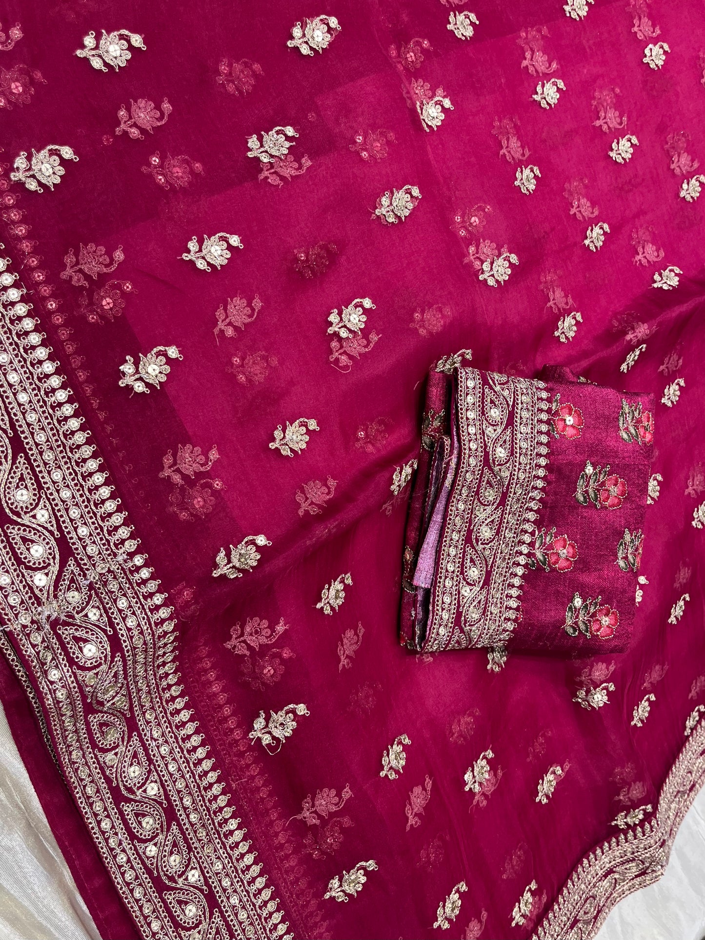 MAGENTA COLOUR PURE GEORGETTE HAND EMBROIDERED SAREE EMBELLISHED WITH AARI & SEQUINS WORK