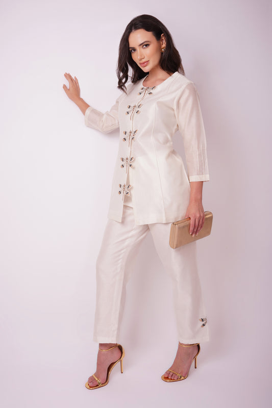 ( DELIVERY IN 25-30 DAYS ) WHITE COLOUR CHANDERI SILK CO-ORDS SET EMBELLISHED WITH RESHAM EMBROIDERY BY SIDDHAIKA