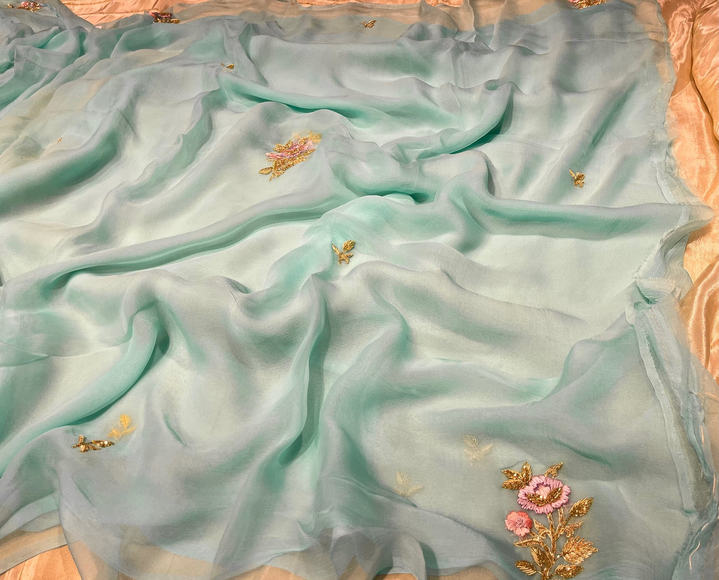 ( DELIVERY IN 25 DAYS ) AQUA COLOUR CHIFFON HAND EMBROIDERED SAREE EMBELLISHED WITH RESHAM, CUTDANA & ZARDOSI WORK