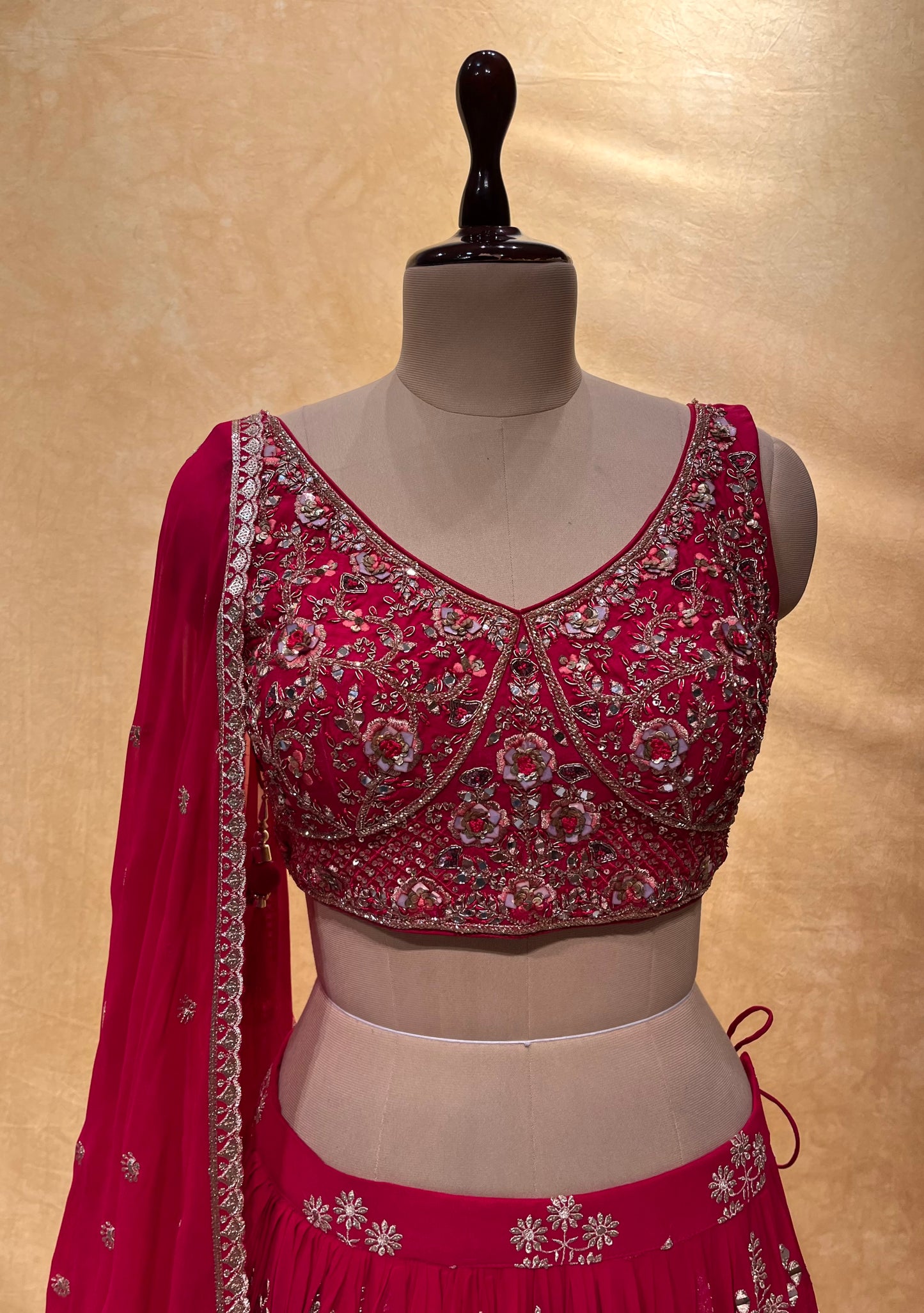 DARK PINK COLOR GEORGETTE EMBROIDERED LEHENGA WITH CROP TOP BLOUSE EMBELLISHED WITH MIRROR & ZARI WORK