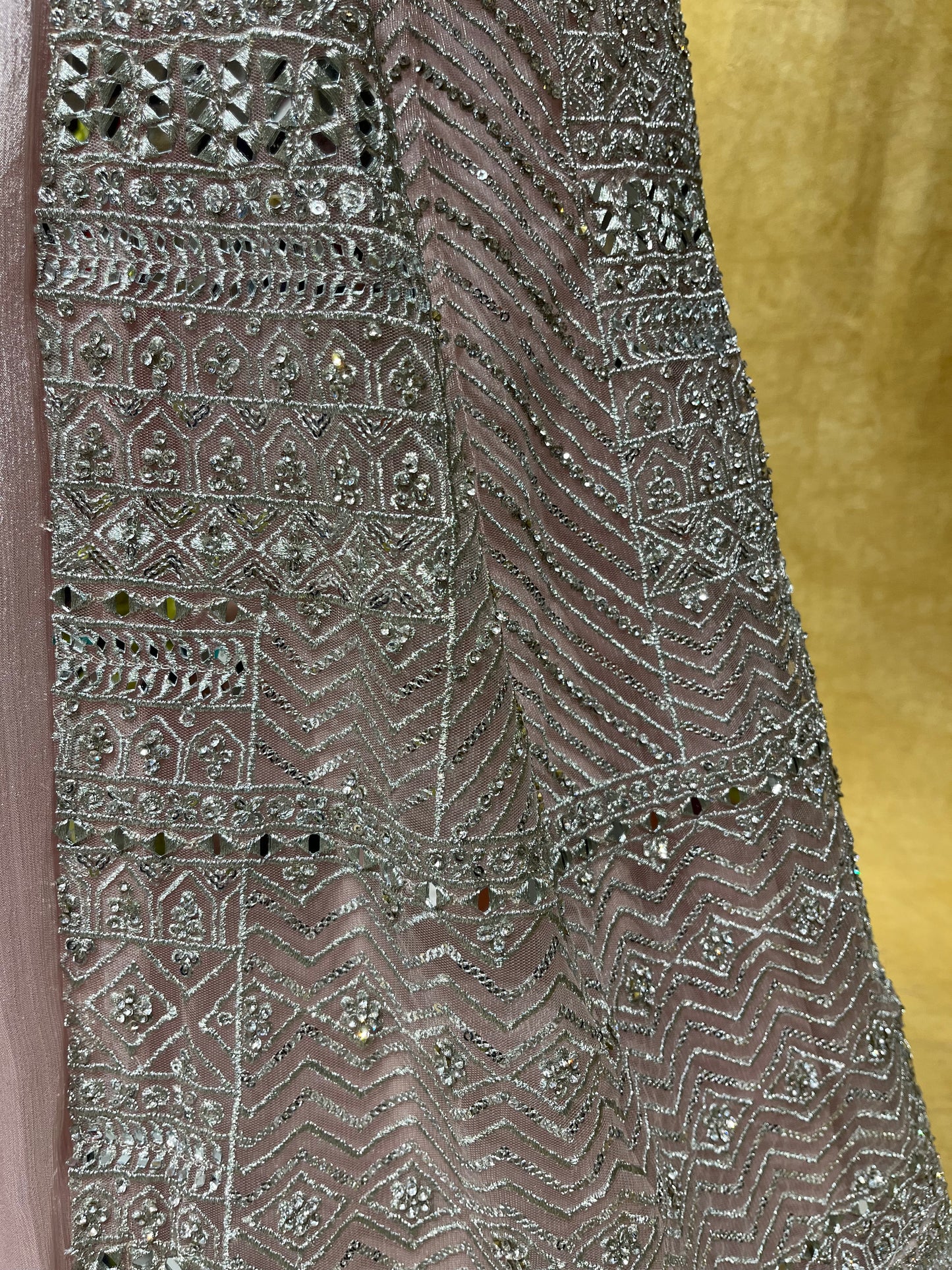 PINK COLOR NET EMBROIDERED SKIRT WITH CROP TOP BLOUSE, SHRUG & DUPATTA EMBELLISHED WITH ZARI & MIRROR WORK