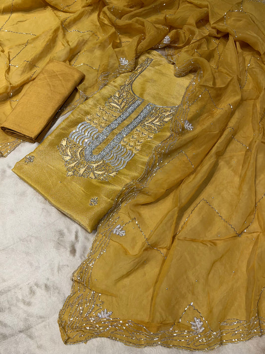 YELLOW COLOUR GEORGETTE TISSUE UNSTITCHED SUIT WITH ORGANZA DUPATTA EMBELLISHED WITH CUTDANA, SEQUINS & PEARL WORK