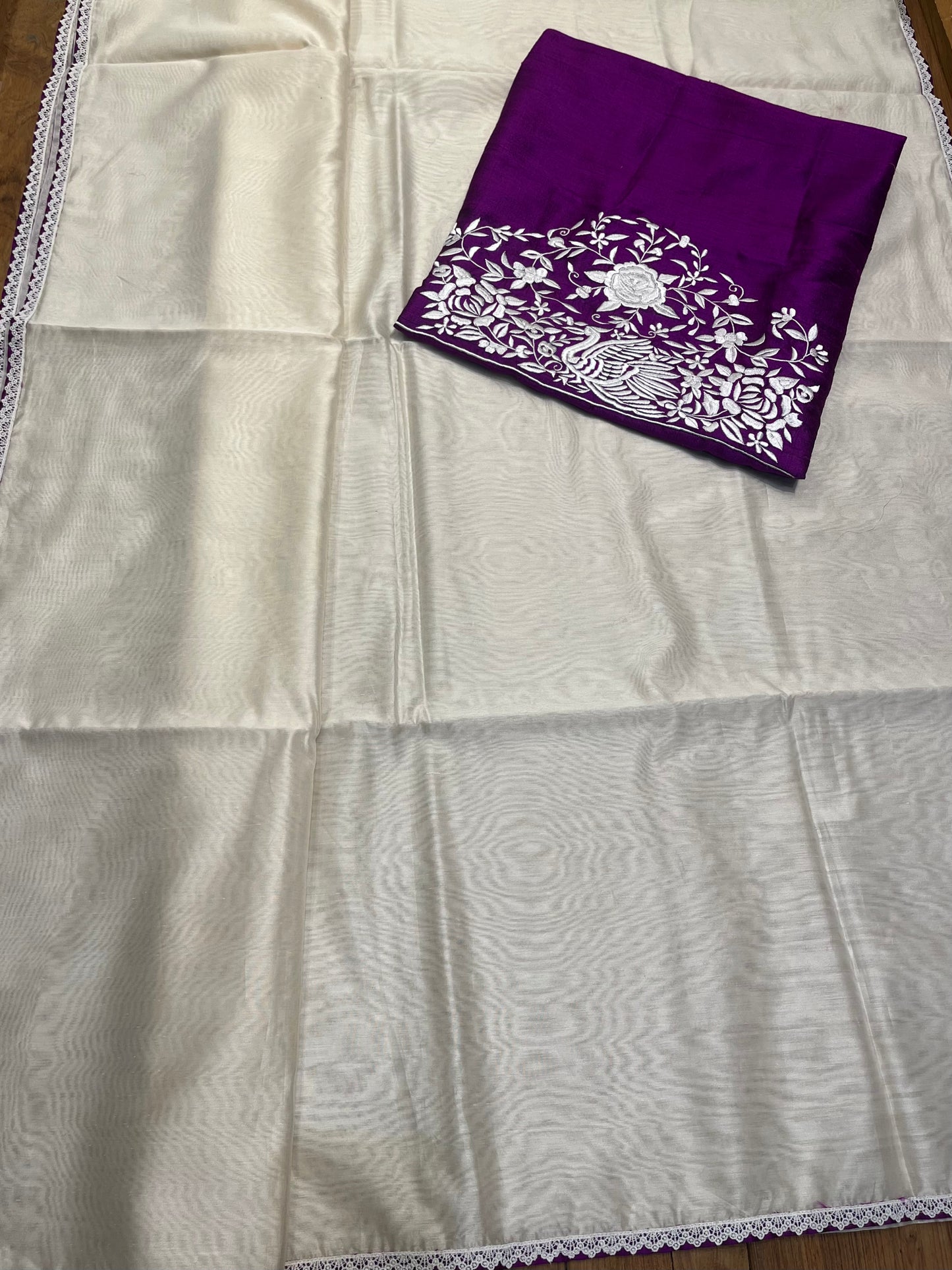 WHITE COLOUR CHANDERI SAREE WITH RAW SILK UNSTITCHED PARSI EMBROIDERED BLOUSE BY SIDDHAIKA - Kothari Sons