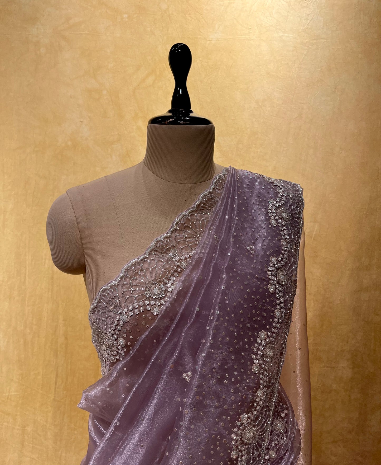 MAUVE COLOR ORGANZA TISSUE HAND EMBROIDERED SAREE EMBELLISHED WITH SEQUINS, CUTDANA & PEARL WORK