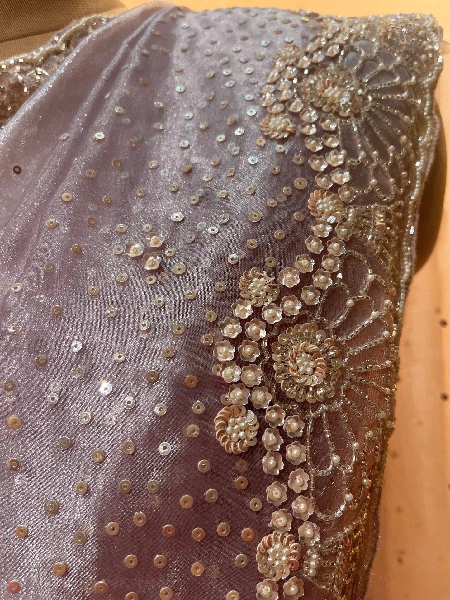 MAUVE COLOR ORGANZA TISSUE HAND EMBROIDERED SAREE EMBELLISHED WITH SEQUINS, CUTDANA & PEARL WORK