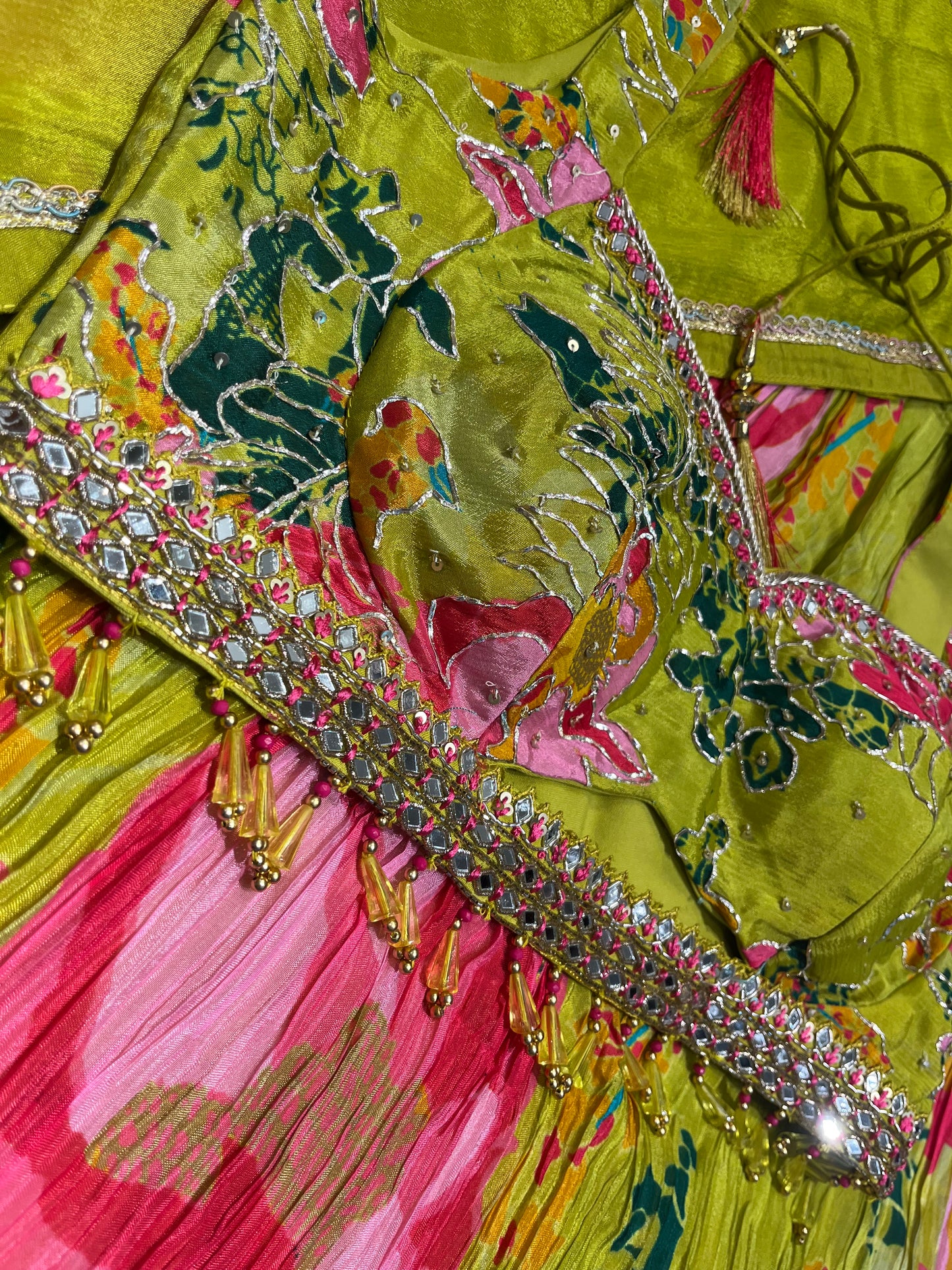 ( DELIVERY IN 15-20 DAYS ) PARROT GREEN COLOUR CREPE SILK SKIRT WITH READYMADE BLOUSE EMBELLISHED WITH CUTDANA WORK