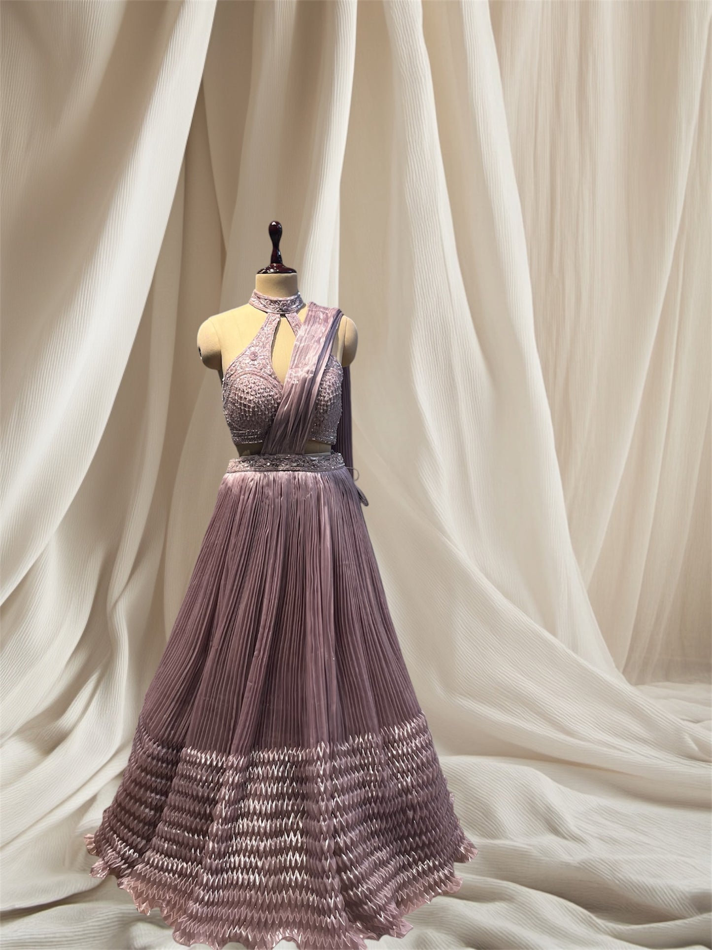 MAUVE COLOUR ORGANZA CROP TOP LEHENGA EMBELLISHED WITH BEADS AND CRYSTAL WORK