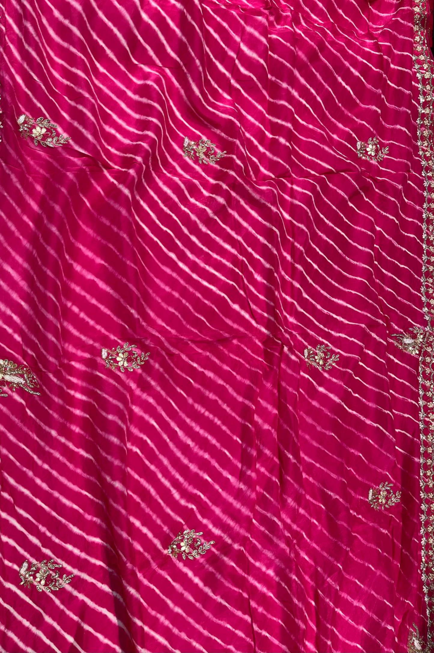 HOT PINK LEHERIYA SILK SAREE WITH CUTDANA EMBELLISHMENTS