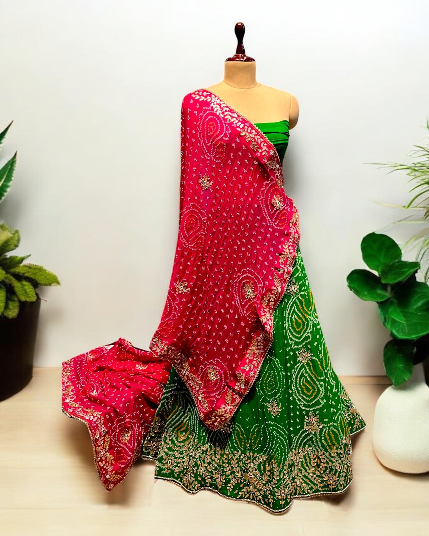 GREEN COLOUR GEORGETTE OJARIYA BANDHANI LEHENGA WITH UNSTITCHED BLOUSE EMBELLISHED WITH GOTA PATTI & CUTDANA WORK