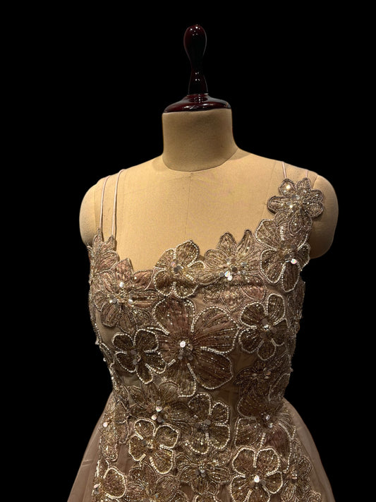 PEACH COLOUR TISSUE GOWN EMBELLISHED WITH CUTDANA & SEQUINS WORK