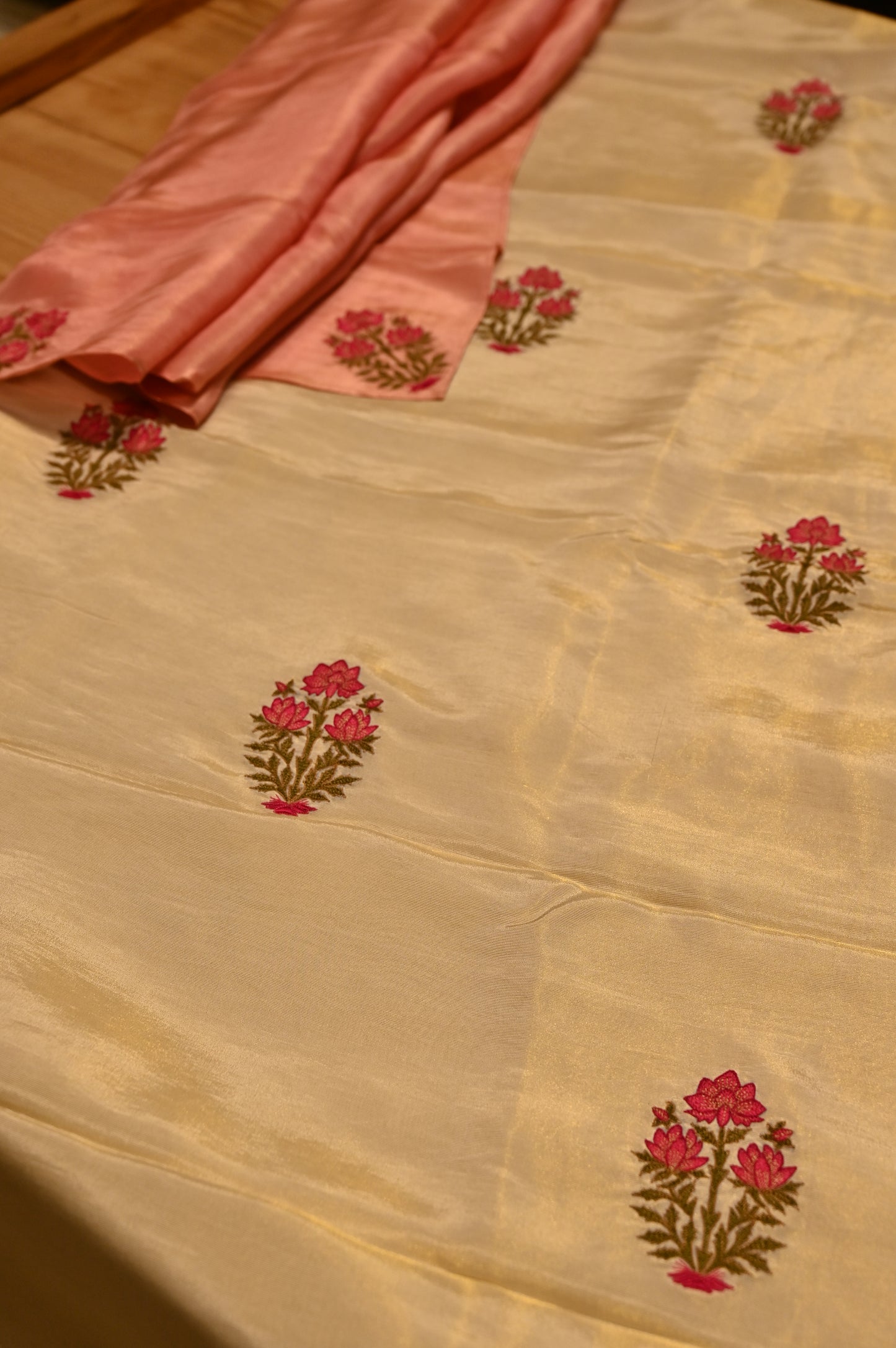 OFF-WHITE GOLD GEORGETTE TISSUE UNSTITCHED SUIT WITH MUGHAL EMBROIDERY & PEACH DUPATTA
