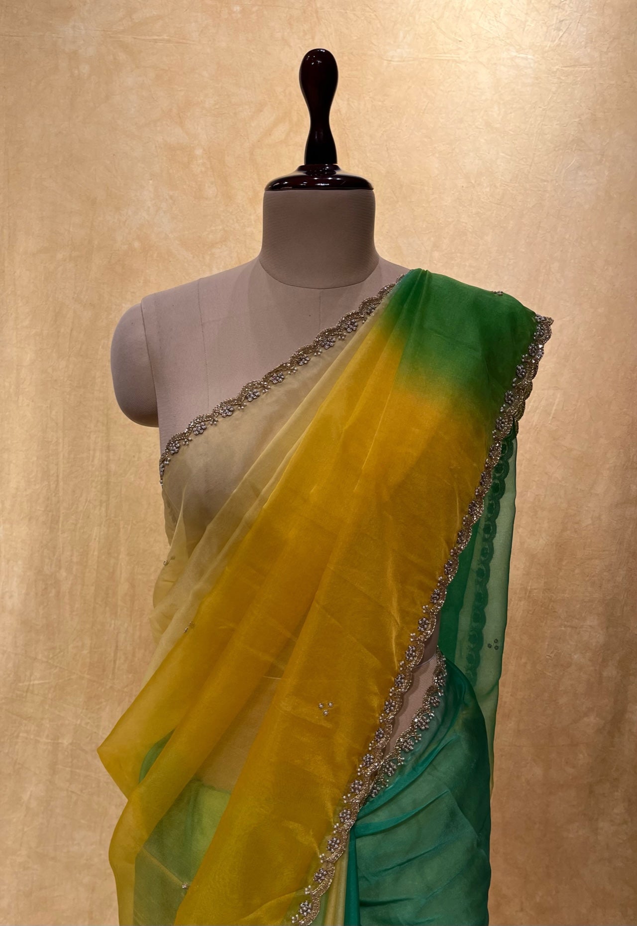 ( DELIVERY IN 25 DAYS ) GREEN & YELLOW SHADED ORGANZA SCALLOPED BORDER EMBROIDERED SAREE EMBELLISHED WITH CUTDANA & PEARL WORK