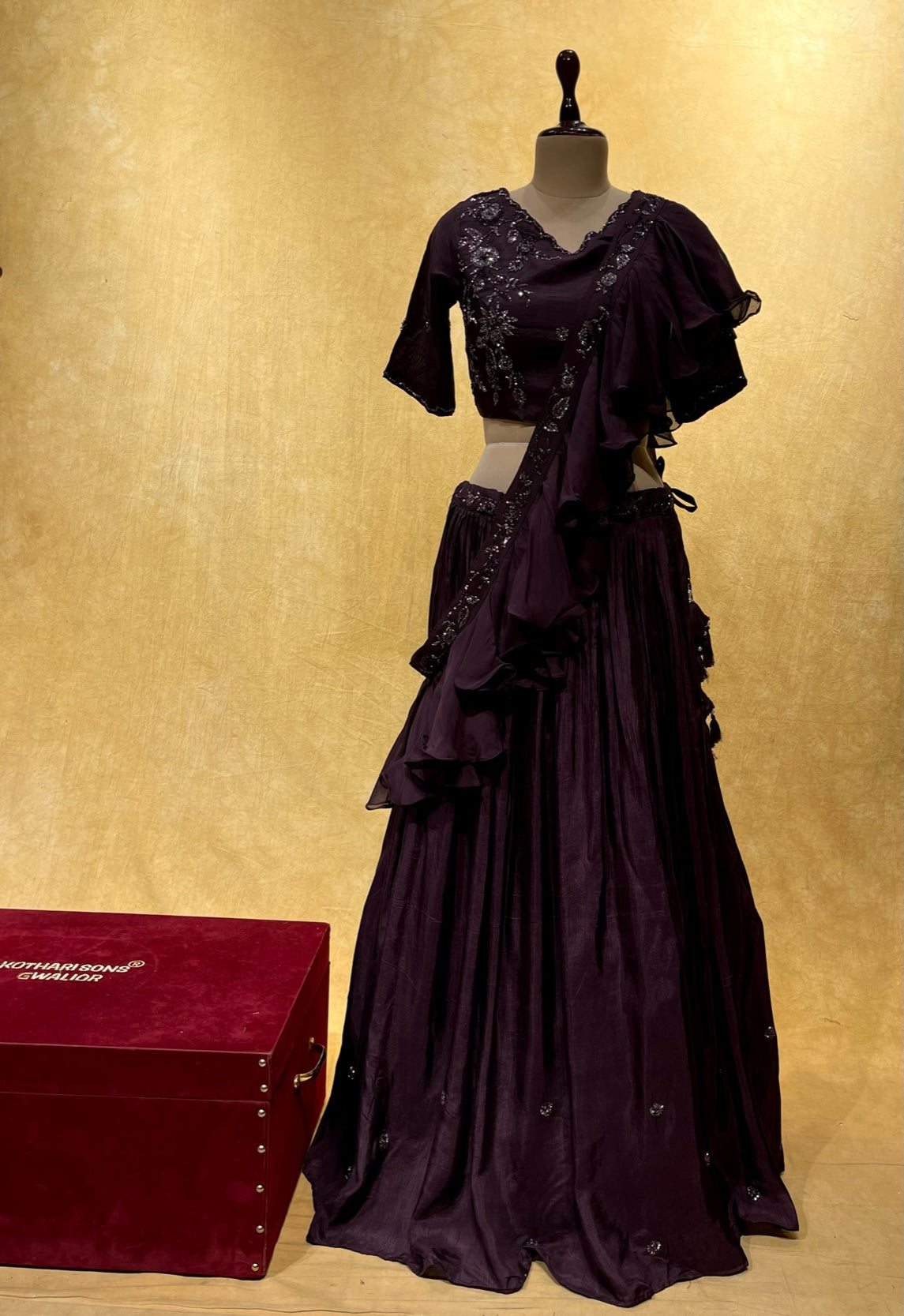 PURPLE COLOUR CREPE SILK SKIRT WITH EMBROIDERED BLOUSE & RUFFLE DUPATTA EMBELLISHED WITH CUTDANA, SEQUINS WORK