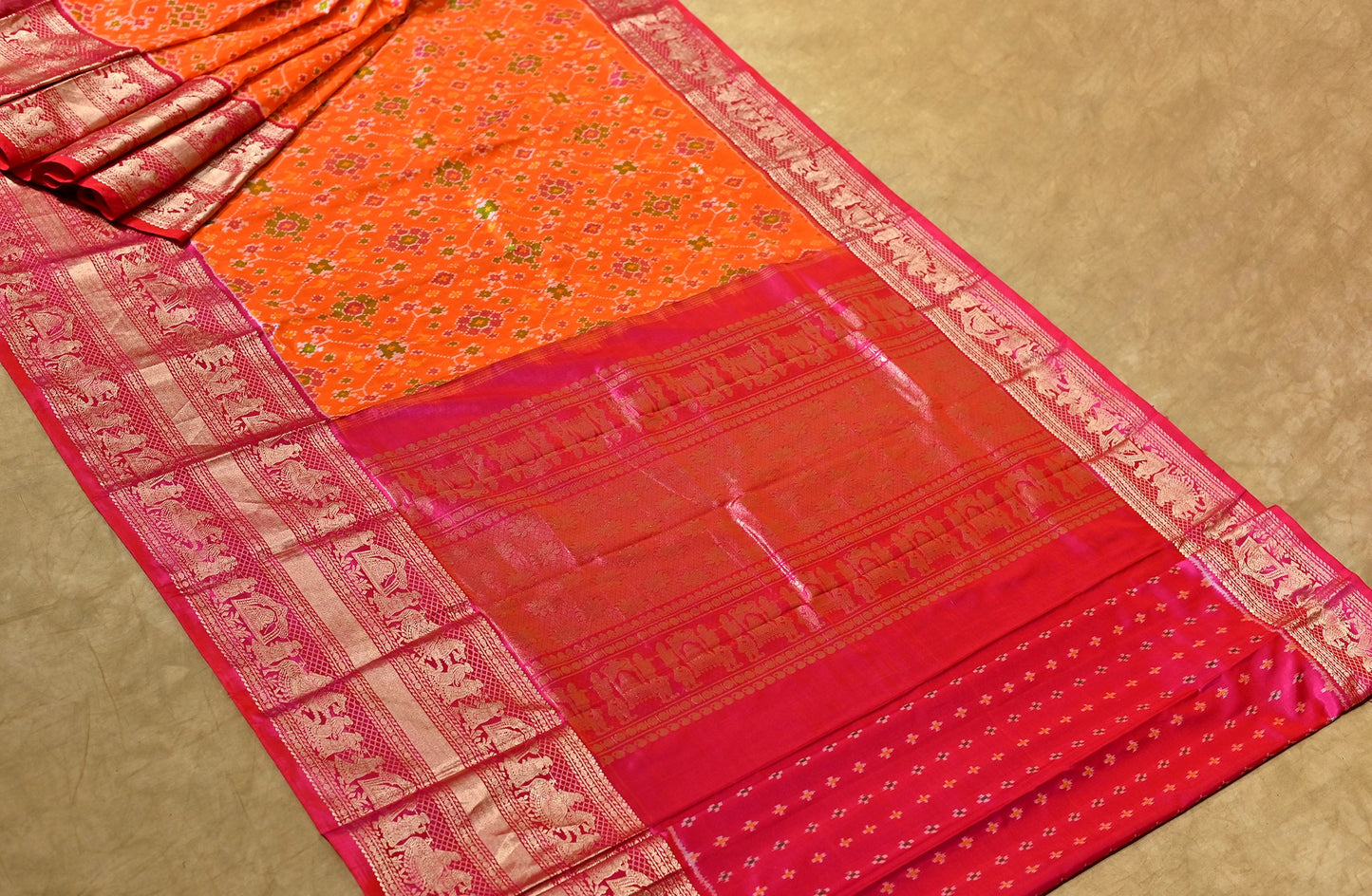ORANGE PATOLA SAREE WITH KANJIVARAM BORDER - Kothari Sons