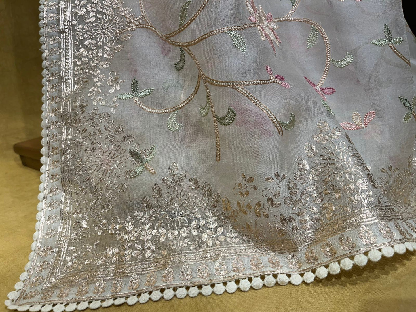 OFF WHITE ORGANZA SAREE EMBELLISHED WITH PITA WORK AND LAKHNAVI JAAL