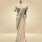 IVORY COLOUR NET SAREE EMBELLISHED WITH CUTDANA & SEQUINS, PAIRED WITH A READYMADE BLOUSE