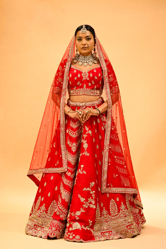 RED BRIDAL WEDDING LEHENGA WITH THREE-PANEL DESIGN, 6-METER FLAIR, DOUBLE DUPATTA, POTLI & EMBROIDERED TASSELS