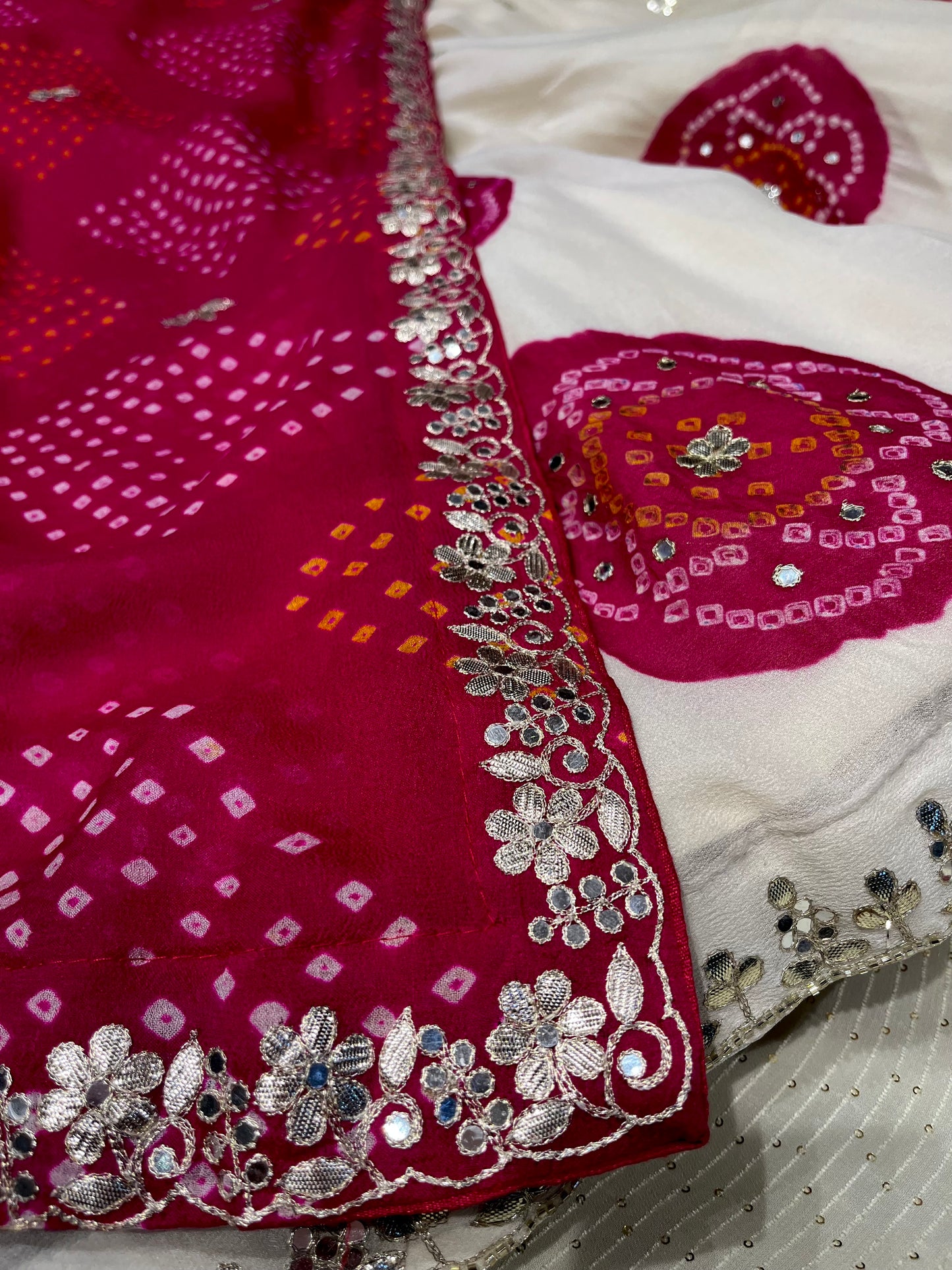 WHITE & RANI PINK GEORGETTE OJARIYA LEHENGA EMBELLISHED WITH GOTA PATTI WORK