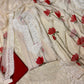 IVORY GEORGETTE SELF-RESHAM EMBROIDERED UNSTITCHED SUIT WITH RED LOTUS PRINT