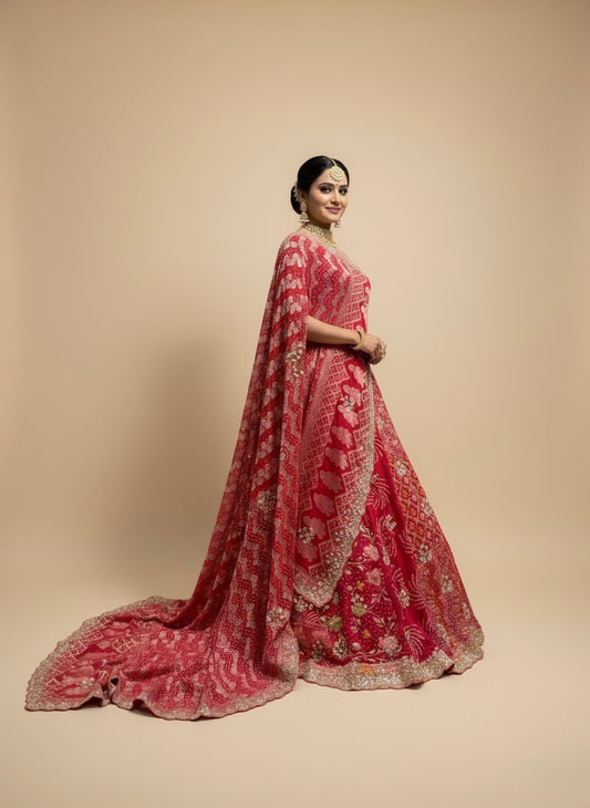 RASPBERRY PINK GEORGETTE BANDHANI LEHENGA EMBELLISHED WITH GOTA PATTI & ZARDOZI WORK