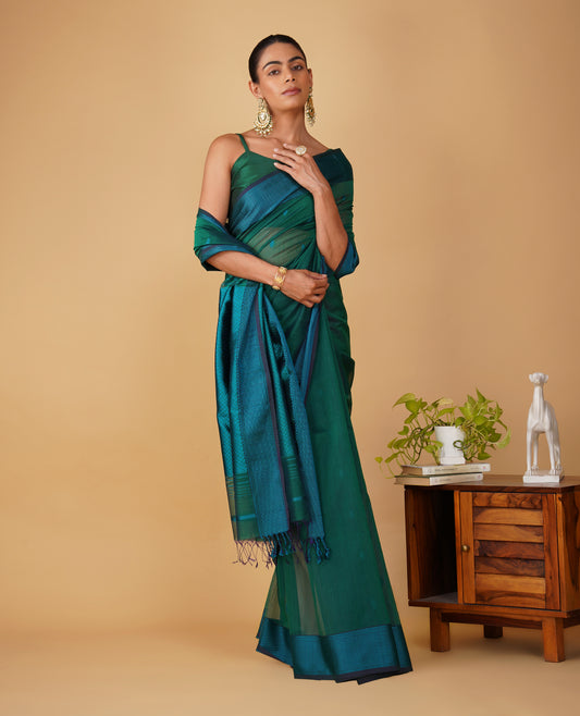 BOTTLE GREEN MAHESHWARI SAREE WITH PEACOCK BLUE RESHAM BORDER & PALLA
