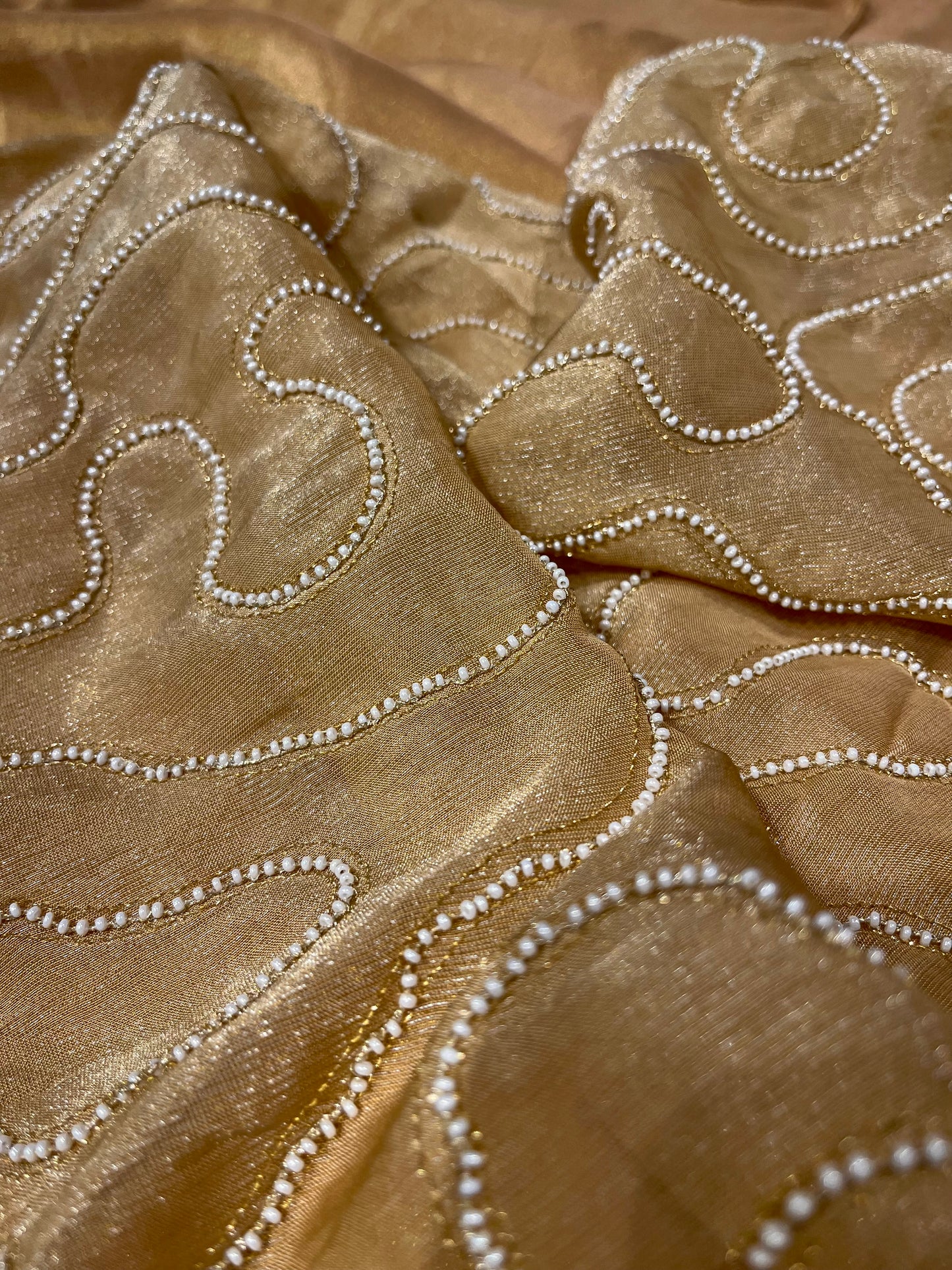 GOLDEN TISSUE SAREE WITH EMBROIDERED TASSELS & PEARL-WORK BLOUSE BY SIDDHAIKA