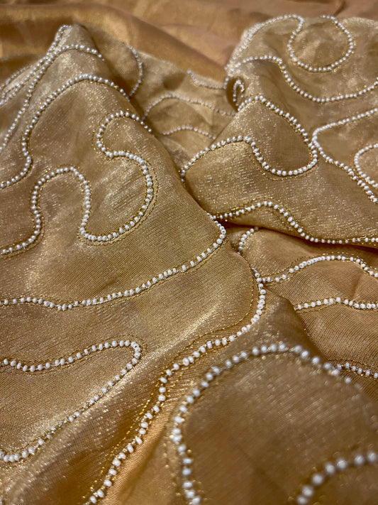 GOLDEN TISSUE SAREE WITH EMBROIDERED TASSELS & PEARL-WORK BLOUSE BY SIDDHAIKA