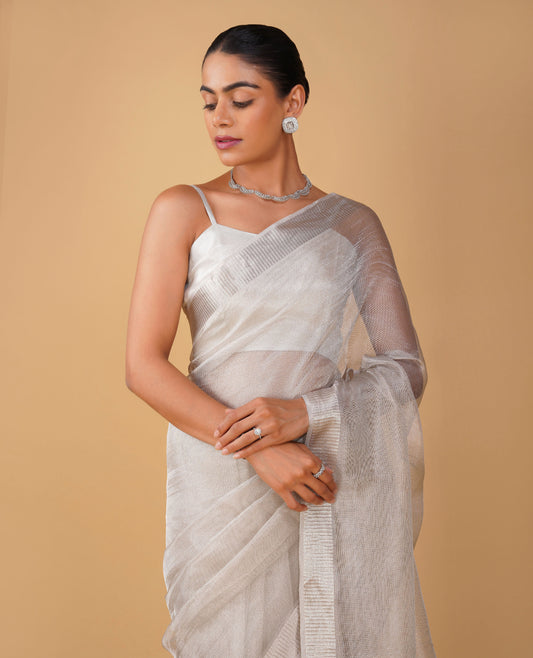SILVER MOCK LENO WEAVE MAHESHWARI SAREE WITH PIANO PATTERN DRILL BORDER & SELF-PRINTED BLOUSE