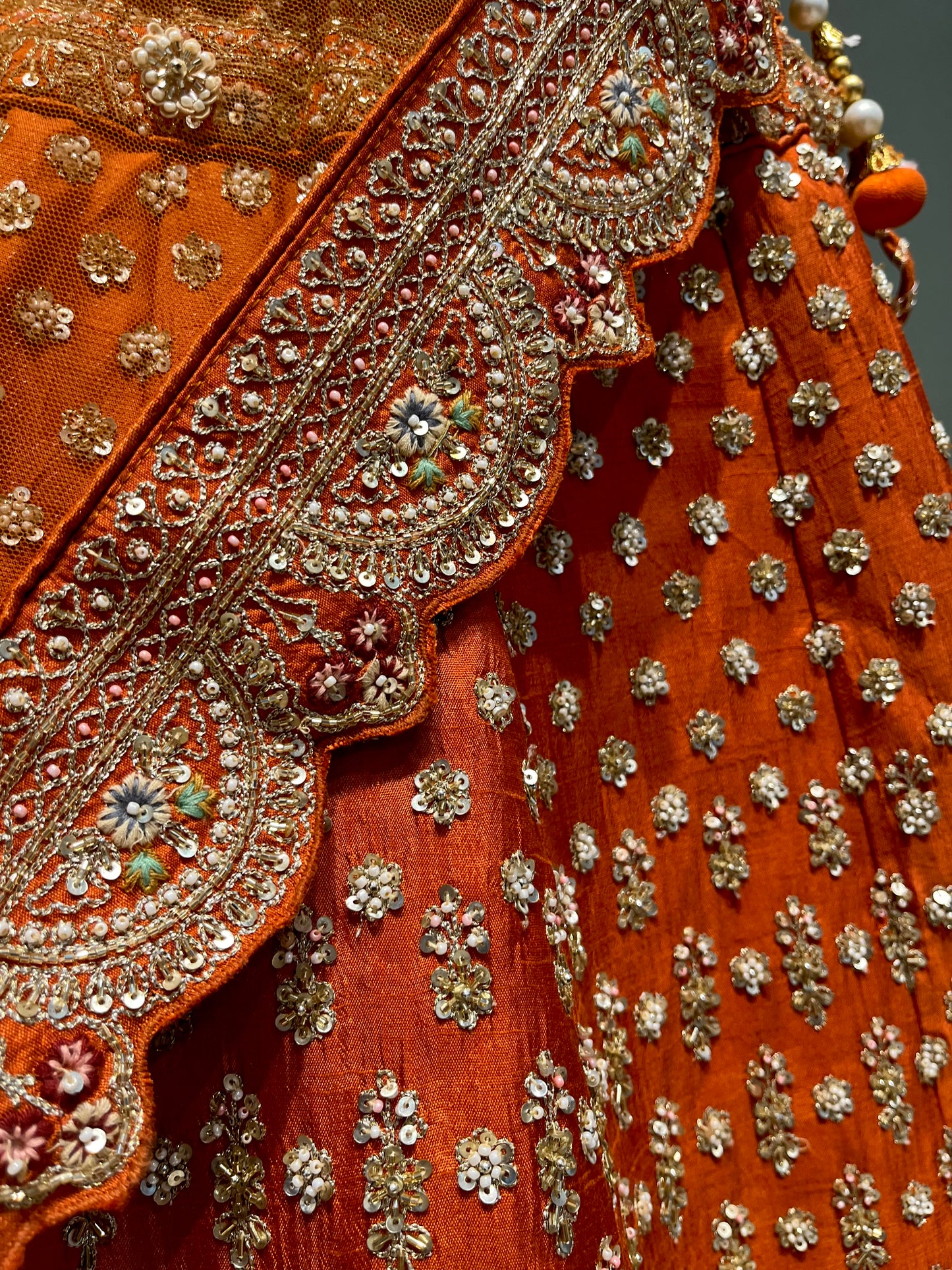 ORANGE BRIDAL LEHENGA WITH AARI ZARDOZI & PEARL HAND EMBROIDERY