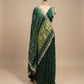 BOTTLE GREEN SATIN SILK BANDHANI SAREE WITH FOIL MIRROR WORK - Kothari Sons