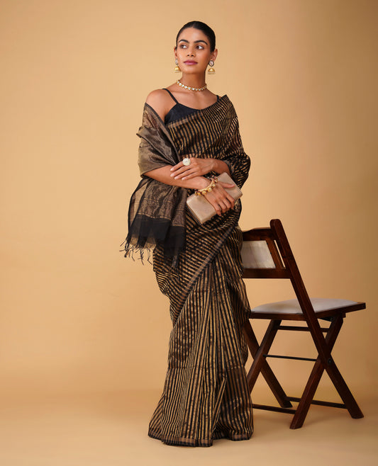 BLACK-GOLDEN VERTICAL STRIPES MAHESHWARI SAREE WITH CHATAI BORDER & PLAIN BLACK BLOUSE