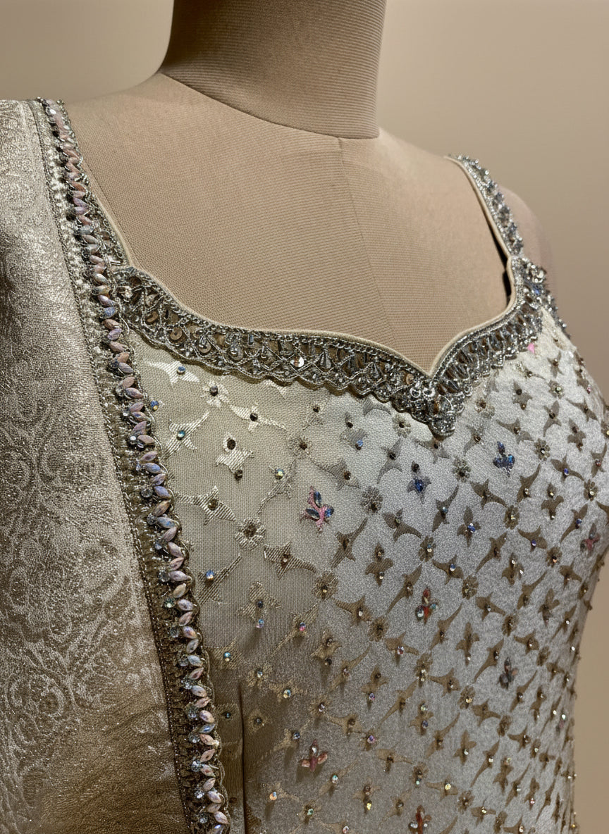 IVORY TISSUE KURTA WITH ZARI & SEQUINS EMBELLISHMENTS PAIRED WITH PALAZZO PANTS